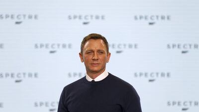 Actor Daniel Craig poses on stage during an event to mark the start of production for the new James Bond film Spectre, at Pinewood Studios in Iver Heath, southern England on December 4, 2014. Stefan Wermuth / Reuters