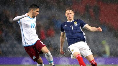 San Marino's Luca Censoni, left, and Scotland's Scott McTominay vie for the ball during the Euro 2020 qualifying match at Hampden Park. Press Association