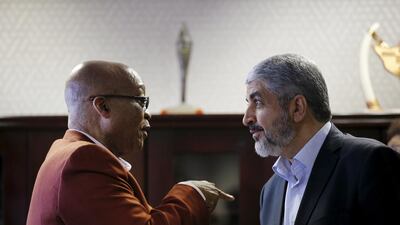 Hamas leader Khaled Meshaal speaks to South African president Jacob Zuma ahead of a media briefing at the headquarters of South Africa's ruling African National Congress (ANC) in Johannesburg. Siphiwe Sibeko / Reuters