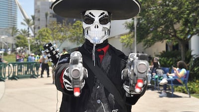 Angel Castillo, of Temecula, California, is dressed as Reaper from "Overwatch" mariachi edition. AP Photo