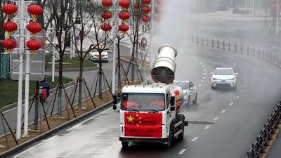 Workers operate a vehicle to carry out disinfection in Jianghan district, following an outbreak of the novel coronavirus in Wuhan, Hubei province, China. REUTERS