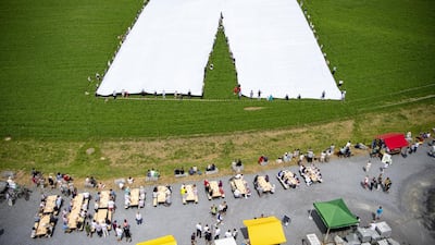 What are claimed to be the biggest pair of trousers in the world are unfurled in the town of Beromuenster, in Lucerne canton, Switzerland. EPA