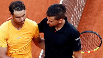 Austria's Dominic Thiem, right, was attacking from the outset before winning in straight sets. Mariscal / EPA