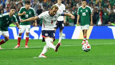 England's Harry Kane scores from the penalty spot. Reuters
