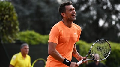 Former Italy and AC Milan defener Paolo Maldini, right, reacts during the men's doubles tennis match, with his partner Stefano Landonio against Poland's player Tomasz Bednarek and Nederland's player David Pel during the ATP Challenger Tour on June 27, 2017 at the Aspria Tennis Club in Milan
