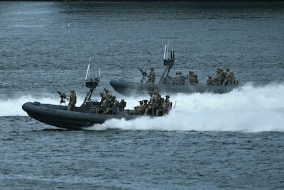 US Coast Guard boats patrol near UN headquarters. AFP