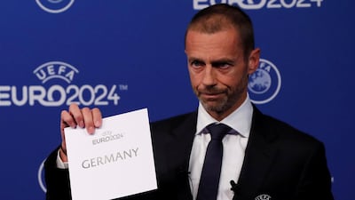 Uefa president Aleksander Ceferin unveils the host nation for Euro 2024 during the announcement in Nyon, Switzerland. Reuters