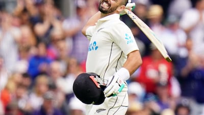 New Zealand's Daryl Mitchell celebrates reaching his century. PA