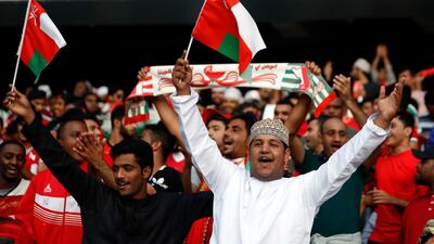 Oman supporters cheer prior to the match. AP Photo