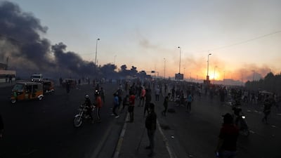 People hold an anti-government protest in Baghdad, Iraq. REUTERS
