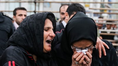 The mother of the killer cries with the mother of the victim.