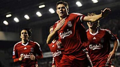 Steven Gerrard celebrates scoring the winner for Liverpool in a 1-0 victory over Portsmouth.
