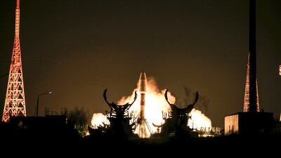A Soyuz-2.1B rocket booster lifts off from Kazakhstan last year. The first such Iranian satellite will be launched from the same site this week. Photo: Roscosmos Space Agency Press Service via AP