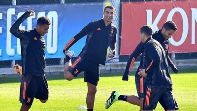 Danilo and Cristiano Ronaldo prepare for their Champions League match against Ferencvaros. EPA