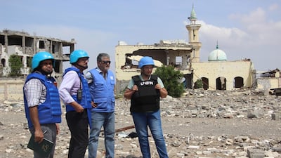 Abhijit Guha, second from left, chair of the UN's Redeployment Co-ordination Committee in Hodeidah city, and his team oversee the deployment of observers on frontlines in Hodeidah in October 2019. EPA