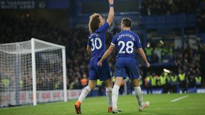 David Luiz, left, celebrates with his teammate Chelsea's Cesar Azpilicueta. AP Photo