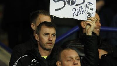 Newcastle United fan holds up a sign for manager Rafa Benitez. Action Images via Reuters / John Sibley