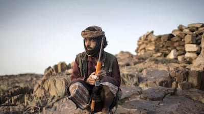 A member of Yemeni resistance forces of Abu Jabr brigade is seen near a front line position in Zi Naem town of Al-Bayda governorate, May 9, 2018. Asmaa Waguih for The National