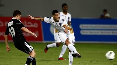 Mirel Radoi has been fined and banned for two matches following as clash with Khalid Jalal.