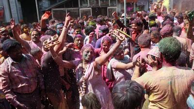 Indians celebrate Holi at Laxmi Narayan temple in Amritsar, India. Raminde Pal Singh / EPA