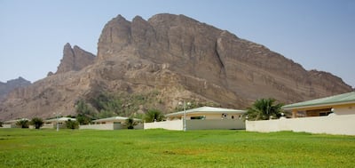 Green Mubazzarah has rolling grassy hillsides and natural hot springs. Photo: Danat Hotels