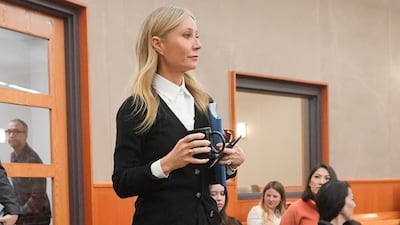 To begin a new week in court on March 27, Paltrow wore a black G.Label by Goop cardigan over a white shirt with a full-length skirt. AP Photo