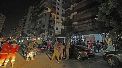 Lebanese security forces inspect the building where a militant attacked a security forces patrol and blew himself when confronted in Tripoli. AFP