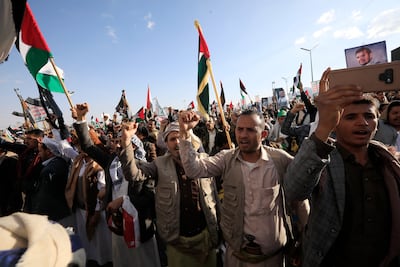 People shout slogans during a protest against the US-led maritime operation in the Red Sea in Sanaa, Yemen. EPA