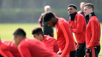 Manchester United’s French striker Anthony Martial (2nd R) takes part in a team training session at their Carrington Training Centre in Manchester, north west England on March 16, 2016 ahead of their Uefa Europa League second leg football match against Liverpool. AFP / Paul ELLIS