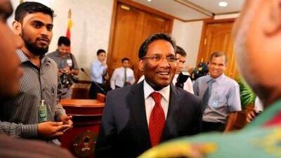 Mohamed Waheed, the newly appointed Maldives president smiles after a press conference at his office in Male. Waheed took charge of the Maldives after the dramatic resignation of Mohamed Nasheed yesterday, whose party said he was the victim of a coup orchestrated by opposition leaders with the backing of security forces.