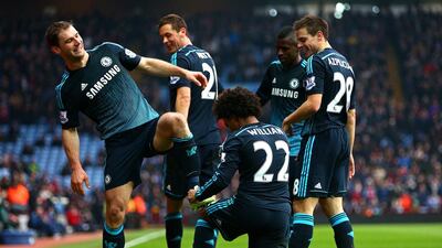 Branislav Ivanovic of Chelsea celebrates with teammates after scoring his team's second goal during the Barclays Premier League match between Aston Villa and Chelsea at Villa Park on February 7, 2015 in Birmingham, England. Getty Images