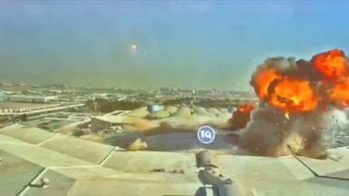 Flames and smoke following the strike on Kuwait International Airport. Questions have been raised about the country's air defences. Reuters