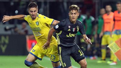 Juventus forward Paulo Dybala takes on Frosinone's Marco Capuano. EPA