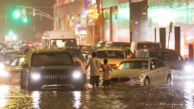 Cars stuck on a street flooded by heavy rain as remnants of Hurricane Ida hit the area in the Queens borough of New York, New York. EPA