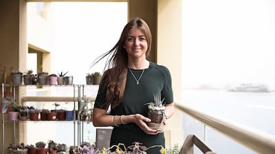 Renee Lang, the founder of Gifts of Life, pictured with some of the succulents that she grows. The Australian sells her products at markets and to a number of Dubai-based cafes. Lee Hoagland / The National