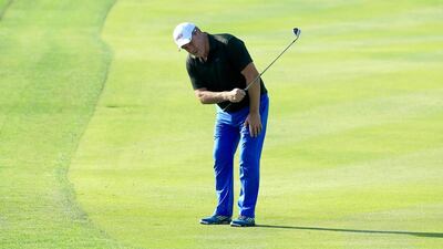Zinzan Brooke, the former New Zealand All Blacks rugby player, chips one handed during the pro-am last week prior to the Abu Dhabi HSBC Golf Championship. David Cannon / Getty Images / January 20, 2016