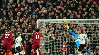 Liverpool's Mohamed Salah scores his side's fourth goal. AP