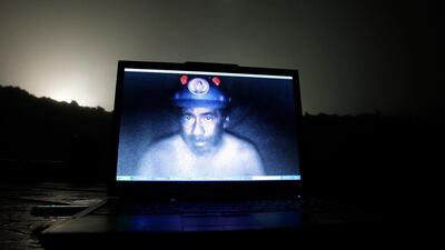 A computer screen shows one of the miners inside the mine at Copiapo, August 26, 2010. REUTERS