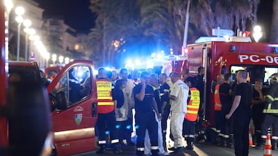 Police officers, firefighters and rescue workers at the site of an attack on the Promenade des Anglais in Nice, France on July 15, 2016. Valery Hache / AFP