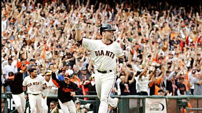 San Francisco Giants' Buster Posey celebrates as he scores the game-winning run scored on a hit by Angel Pagan against the Cincinnati Reds in the ninth inning of a baseball game, Sunday, July 1, 2012, in San Francisco. The Giants won 4-3. (AP Photo/Ben Margot)