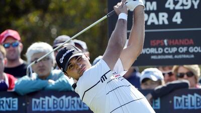Jason Day leads after three rounds at the World Cup of Golf after losing eight relatives in Typhoon Haiyan. Joe Sabljak / EPA