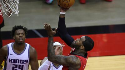 Houston Rockets' John Wall puts up a basket against the Sacramento Kings. AP