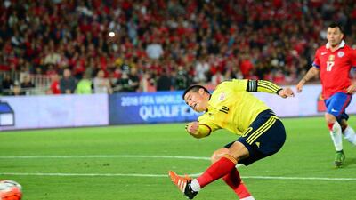 Colombia's James Rodriguez scores the equaliser against Chile on Thursday night in their 2018 World Cup qualifying match. Martin Bernetti / AFP / November 12, 2015
