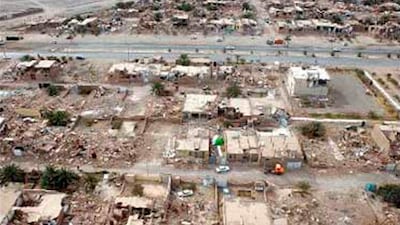 Damaged houses are seen in the earthquake stricken town of Bushehr in Iran. REUTERS / Mehr News Agency
