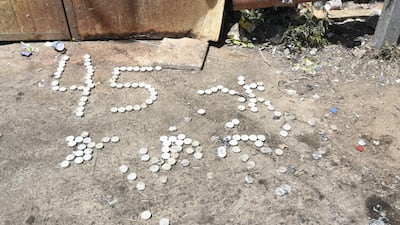 Candles laid out to represent the number of people killed at Mount Meron. Rosie Scammell for The National