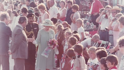 There was a holiday atmosphere as pupils at the British School Al Khubairat lined up to greet the queen.