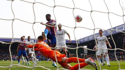 Crystal Palace's Marc Guehi scores their first goal. Reuters
