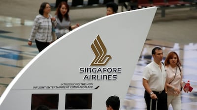 Singapore Airlines signage at Changi Airport in Singapore. The carrier fell short of quarterly profit forecasts. Edgar Su / Reuters