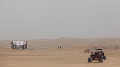 Two competitors head for the starting race arena ahead of the first race. Antonie Robertson / The National