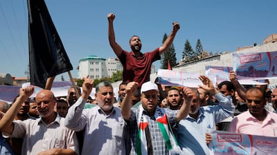 Palestinians in Gaza City shout slogans during a protest against a US-sponsored Middle East economic conference in Bahrain. AFP